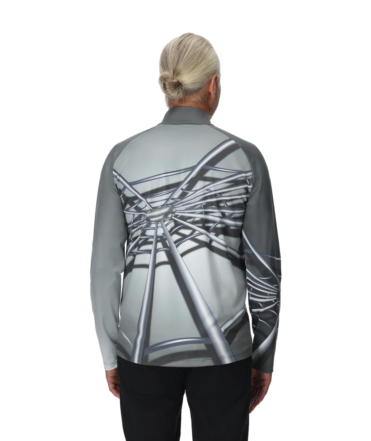 Person wearing a gray long-sleeve shirt with a unique design on the back against a white background