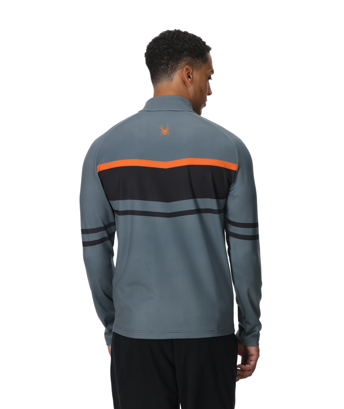 Man wearing a gray and black striped long-sleeve shirt with orange accents on a white background
