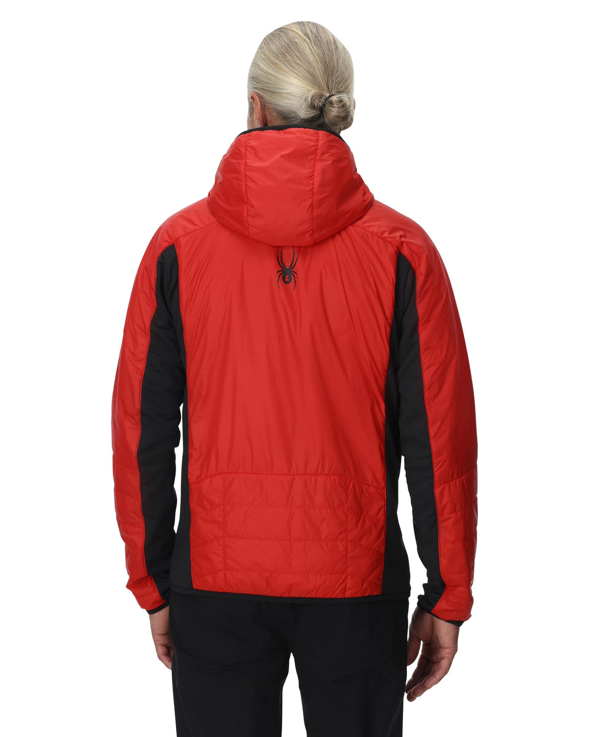 Person wearing a red and black jacket on a white background