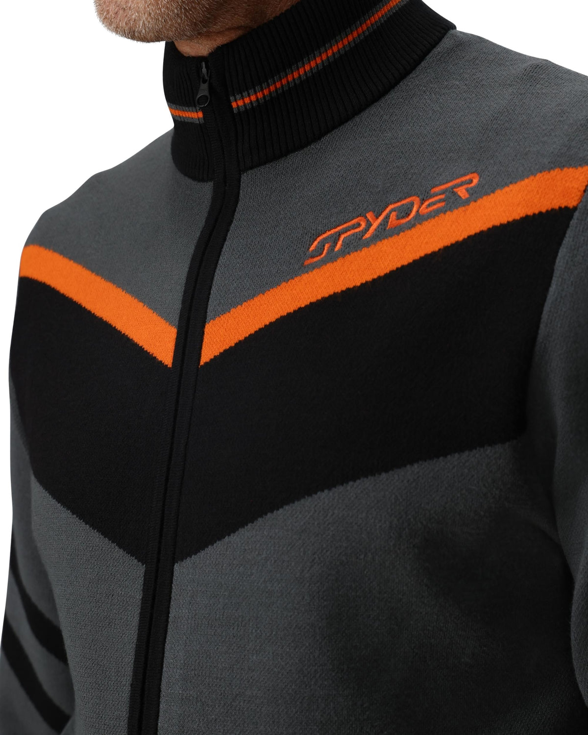 Gray and black jacket with orange accents and Spyder logo