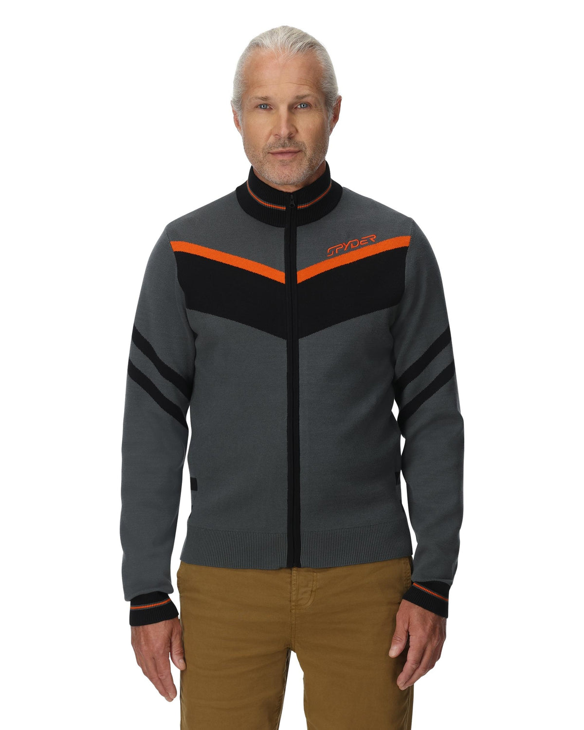 Man wearing a gray jacket with orange and black accents on a white background