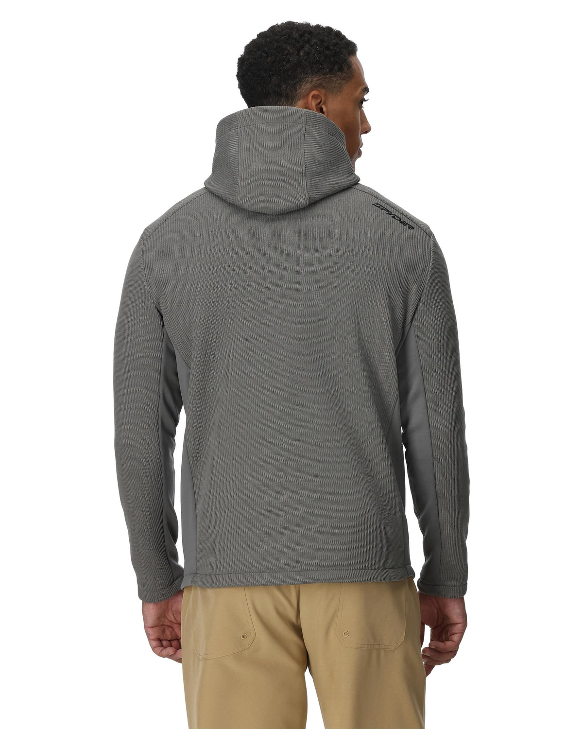 Person wearing a gray hoodie with a white background