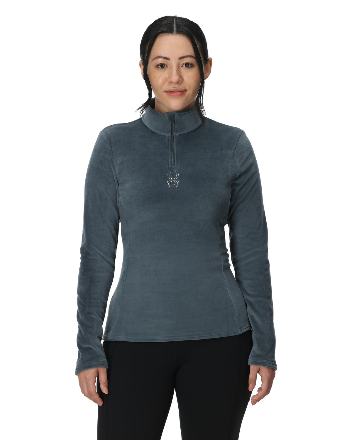 Woman wearing a gray long-sleeve shirt with a brand logo on a white background