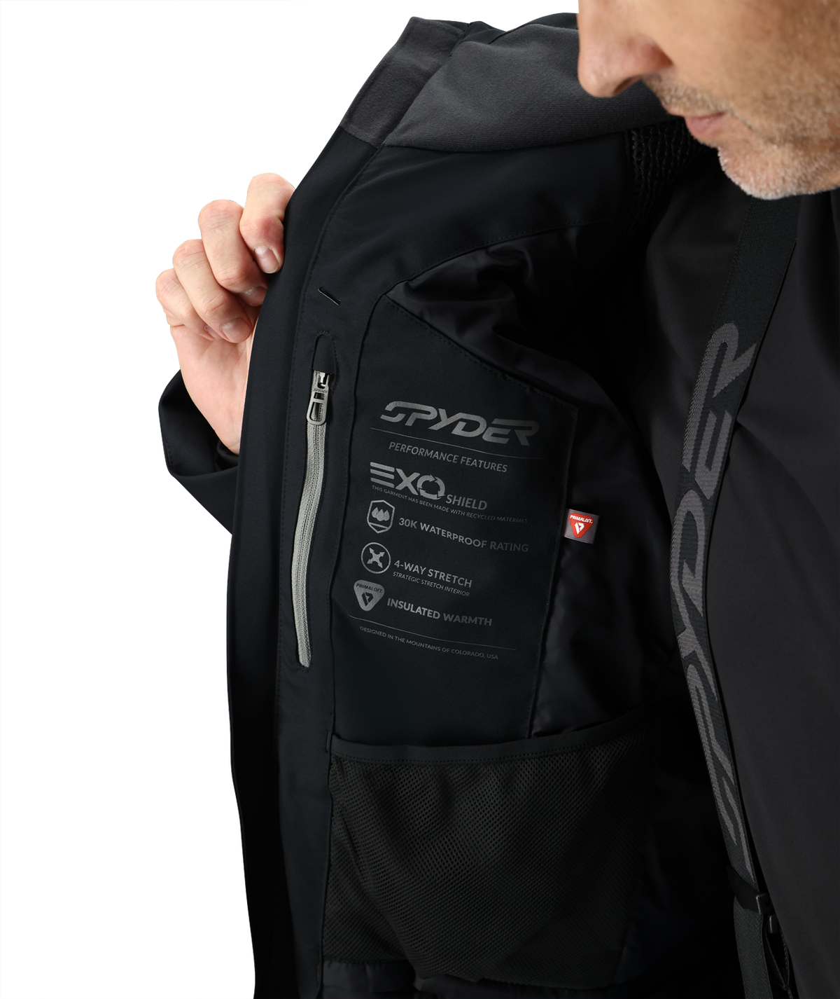 Black Spyder jacket with visible branding and features on a white background