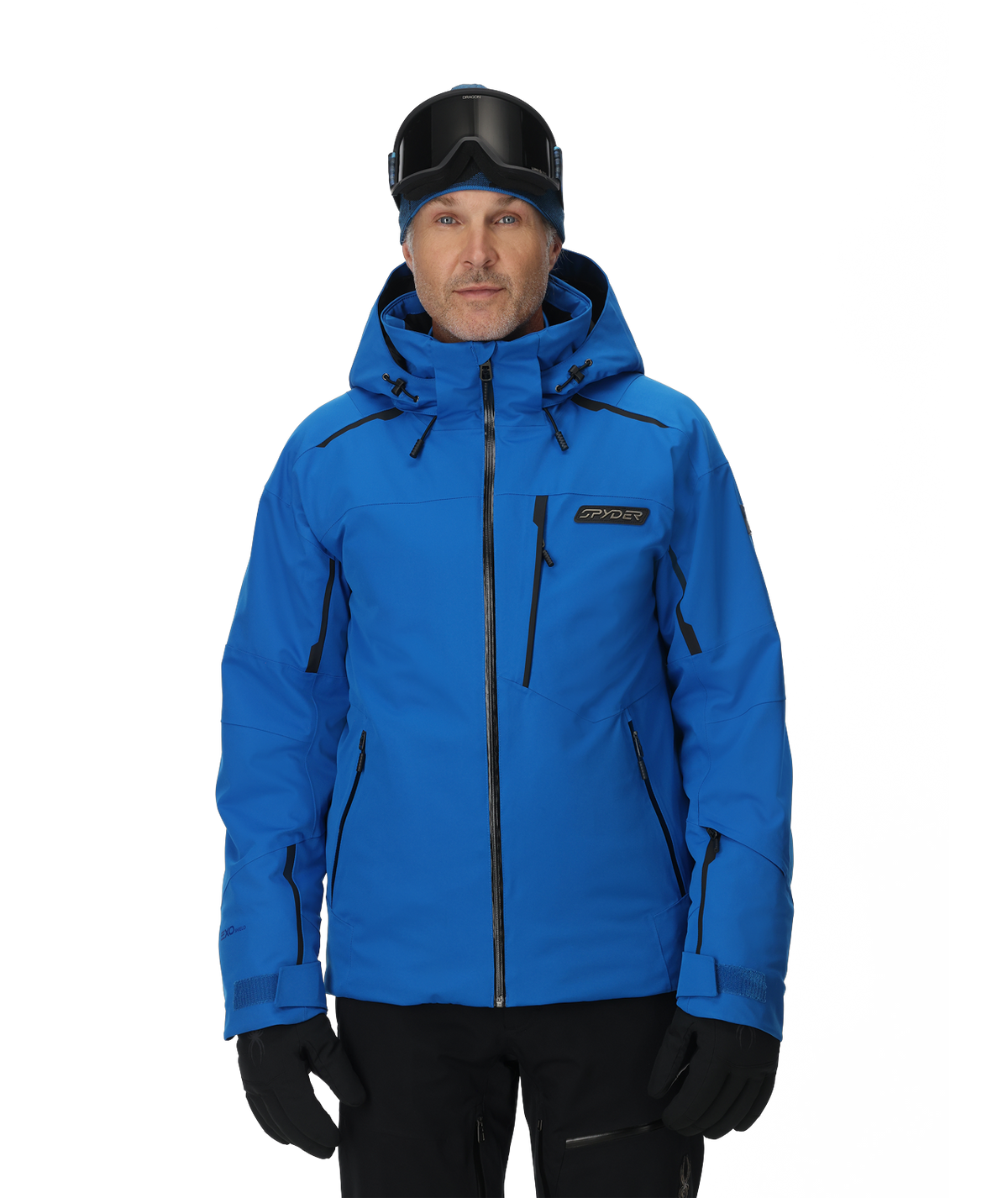 Man wearing a blue ski jacket with black accents on a white background