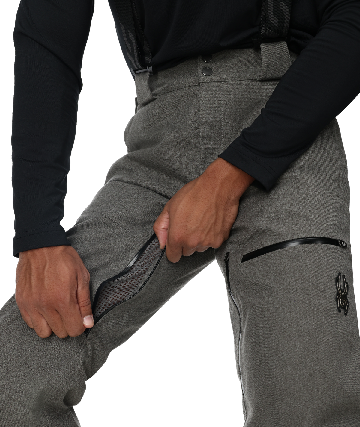 Gray pants with zippers and a black long-sleeve shirt on a white background