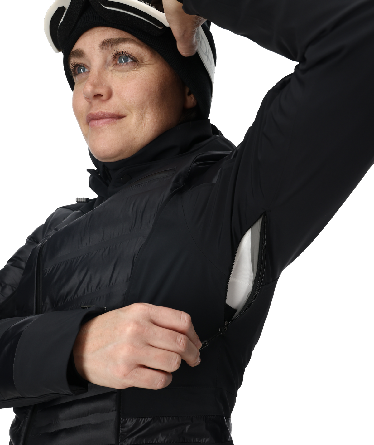Person wearing a black jacket and helmet on a white background