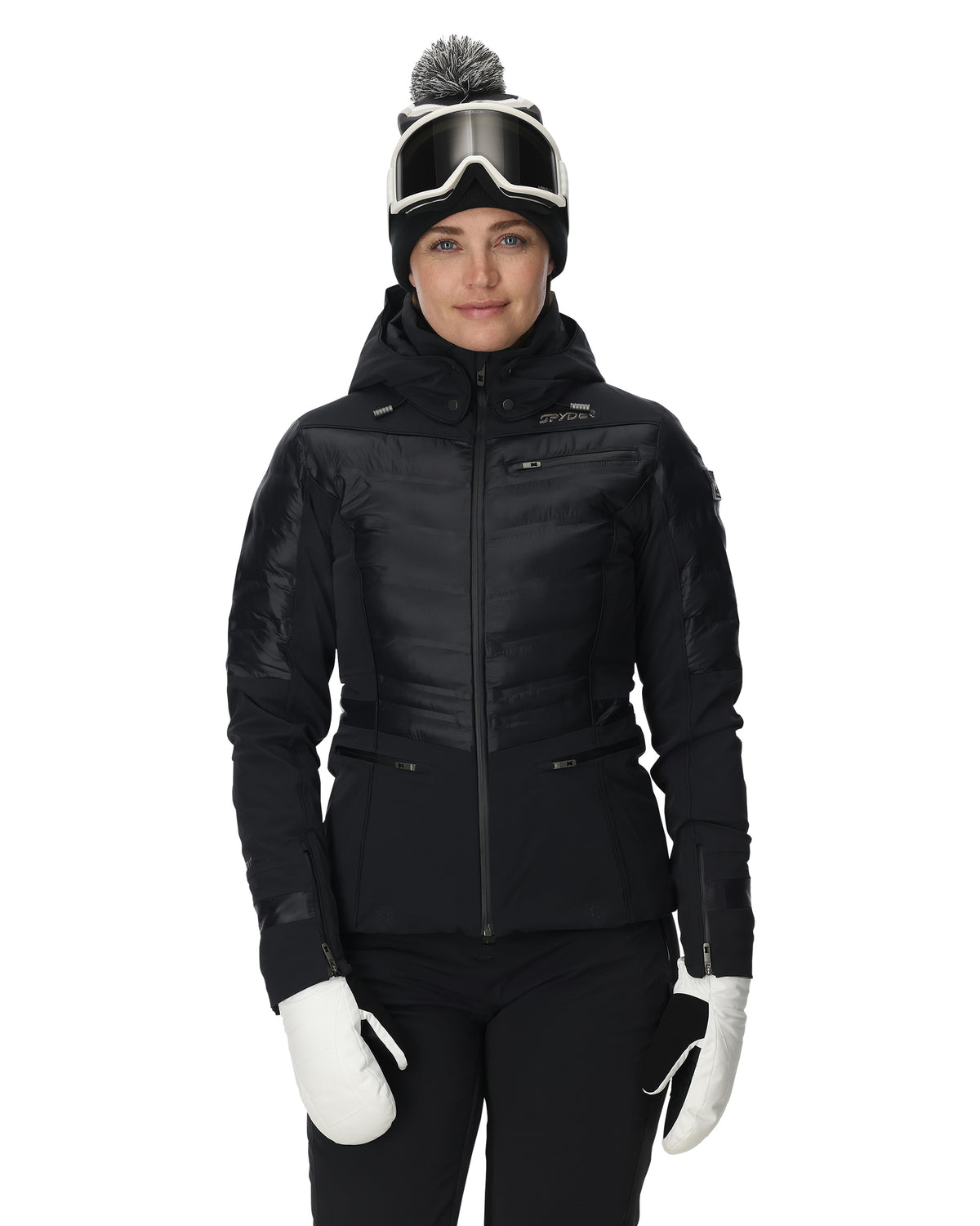 Person wearing a black ski jacket, goggles, and gloves on a white background