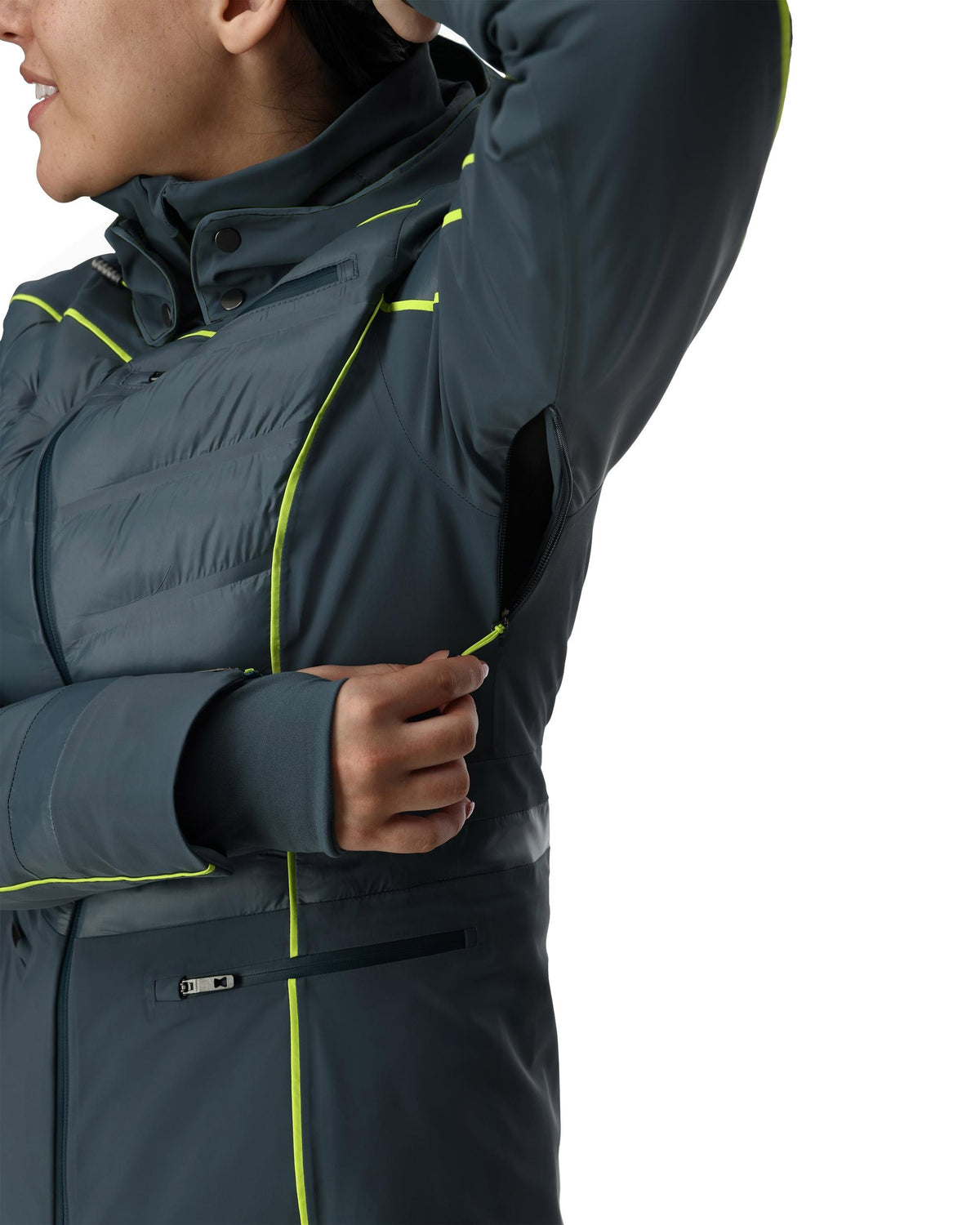Person wearing a dark gray jacket with bright yellow accents on a white background