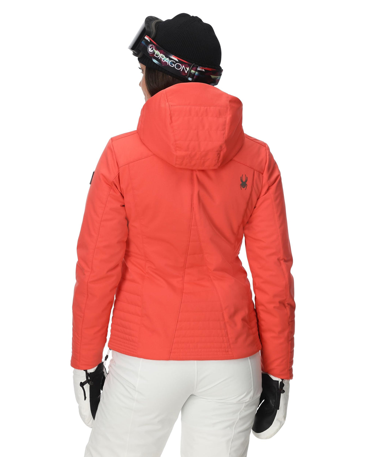 Person wearing a bright orange jacket with a hood on a white background