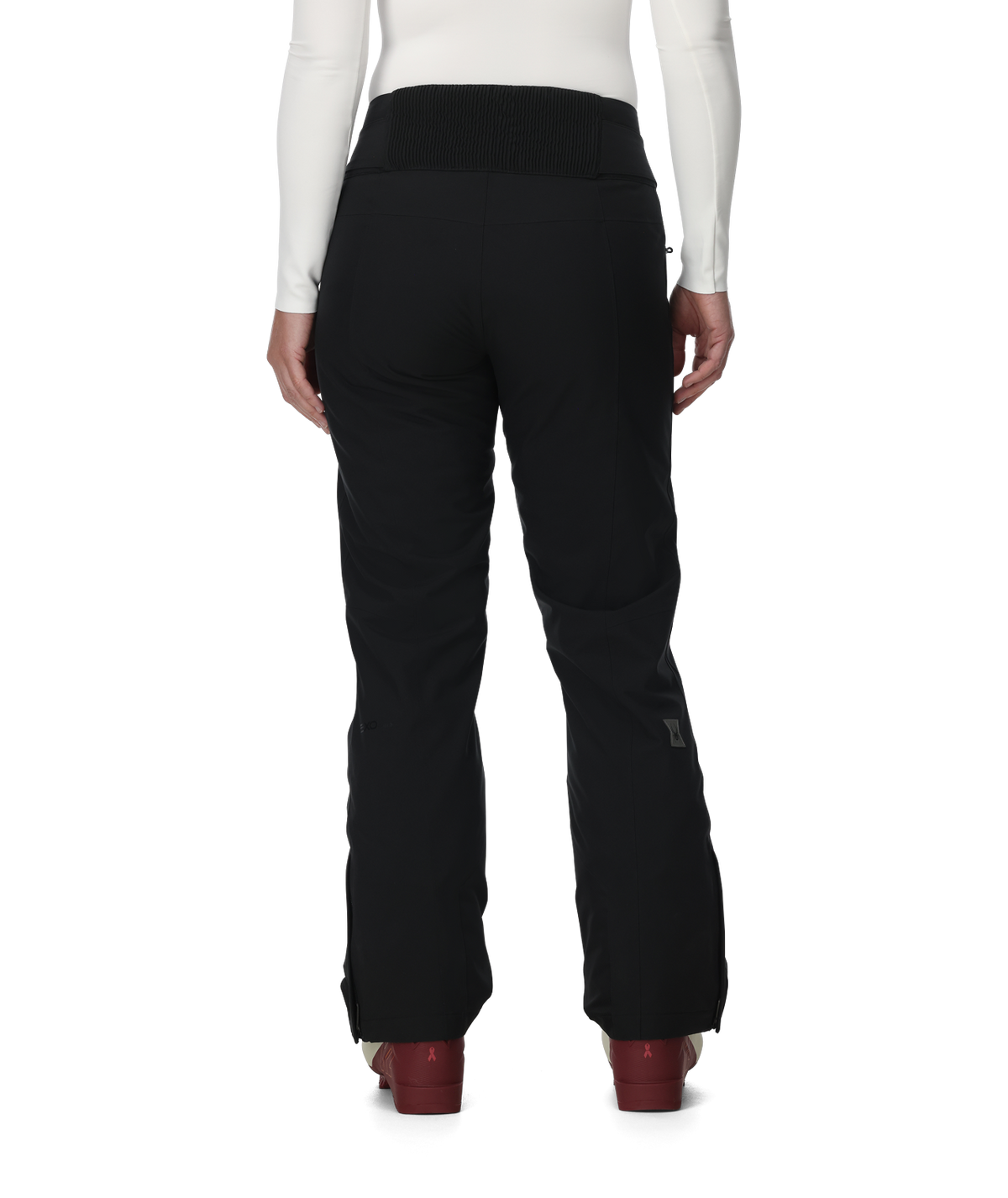 Black pants worn by a person on a white background