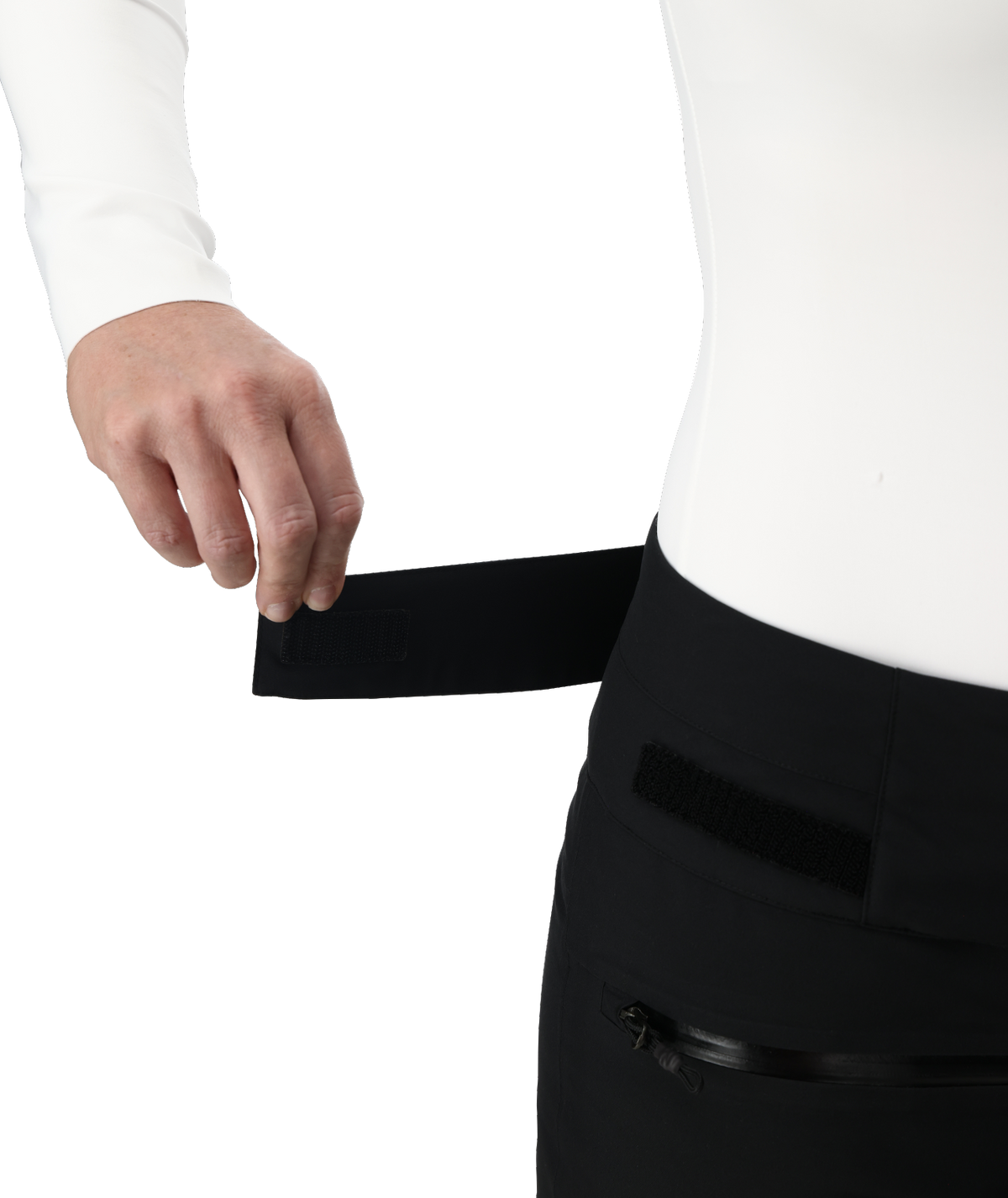 Person wearing a white shirt and black pants with a white background