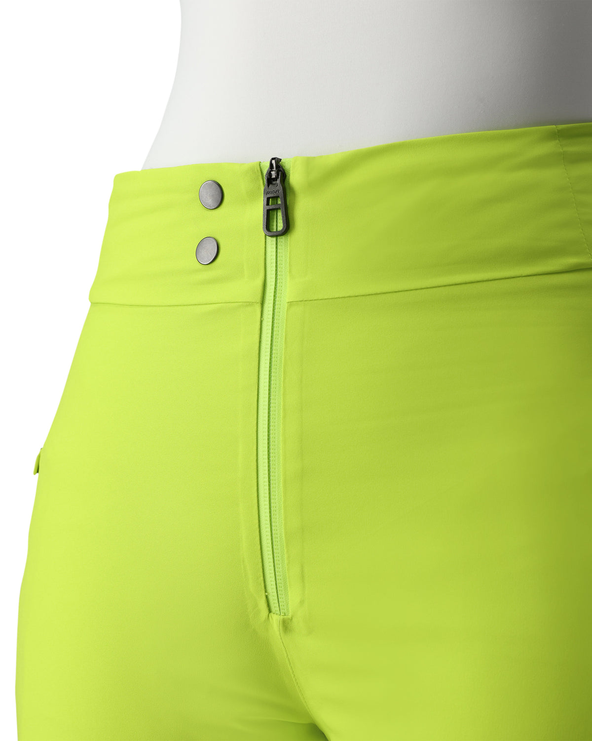 Close-up of bright green pants with a zipper and buttons on a white background