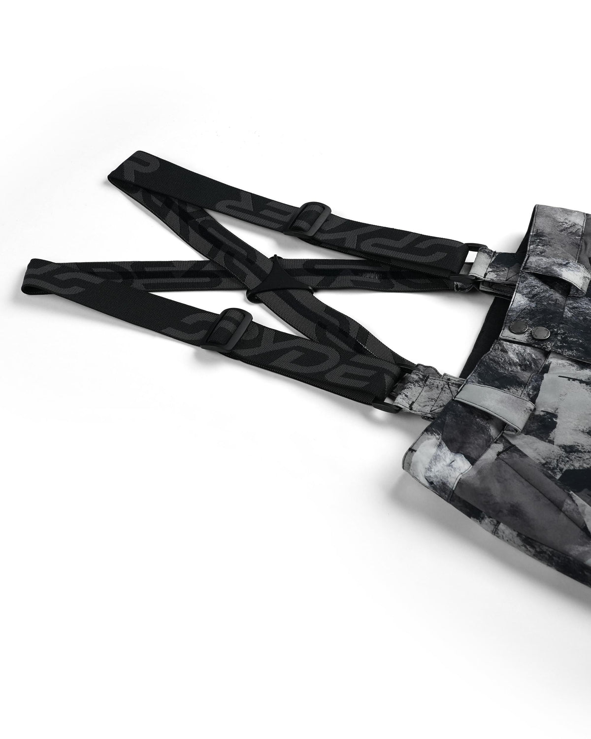 Black harness with a patterned bag on a white background
