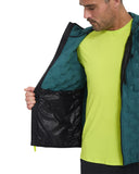 Person wearing a green jacket with a black interior lining, standing against a white background.
