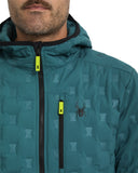 Teal jacket with a pattern and spider logo on a white background