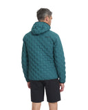 Person wearing a teal quilted jacket on a white background