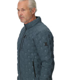 Man wearing a patterned blue jacket on a white background