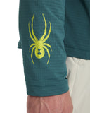 Teal jacket with a yellow spider logo on a white background