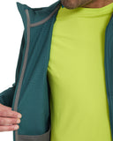 Person wearing a green jacket with a close-up of the zipper and fabric texture.