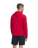Man wearing a red hoodie and black shorts on a white background