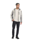 Man wearing a gray and white jacket with a hood on a white background