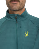 Teal jacket with a yellow logo on a white background