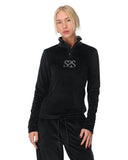 Woman wearing a black pullover with a logo on a white background