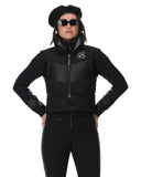 Person wearing a black jacket with a brand logo on a white background