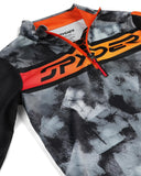 Close-up of a jacket with a brand logo on a white background