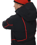 Person wearing a black jacket with red accents on a white background