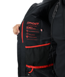 Black jacket with red accents and Spyder branding on a white background