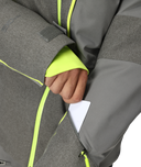 Gray jacket with neon green zippers and trim, showing a hand reaching into a pocket.