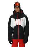 Person wearing a black, white, and red ski jacket with a brand logo on a white background