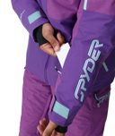 Purple snow pants with brand logo on a white background