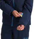 Person wearing a navy jacket with blue accents, interacting with a card.
