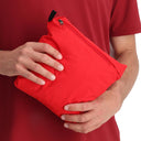 Packable into the right hand pocket