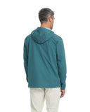 Man wearing a teal jacket on a white background