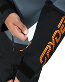 Close-up of a black jacket with orange branding on a white background
