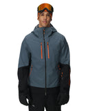 Person wearing a gray and black jacket with orange accents on a white background