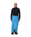 Person wearing a black top and blue pants on a white background
