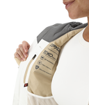 Person wearing a beige and gray EXO performance fabric sleeve on a white background