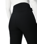 Black leggings worn by a person on a white background
