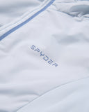 Close-up of a light gray jacket with 'Spyder' branding.