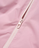Close-up of a pink jacket with a zipper
