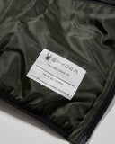 Spyder label on a green fabric background