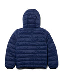 Blue puffer jacket with a hood on a white background