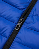 Close-up of a blue puffer jacket with a black zipper