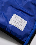 Spyder label on a blue jacket with 'This belongs to: Hand me down' text