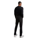 Man wearing a black outfit on a white background
